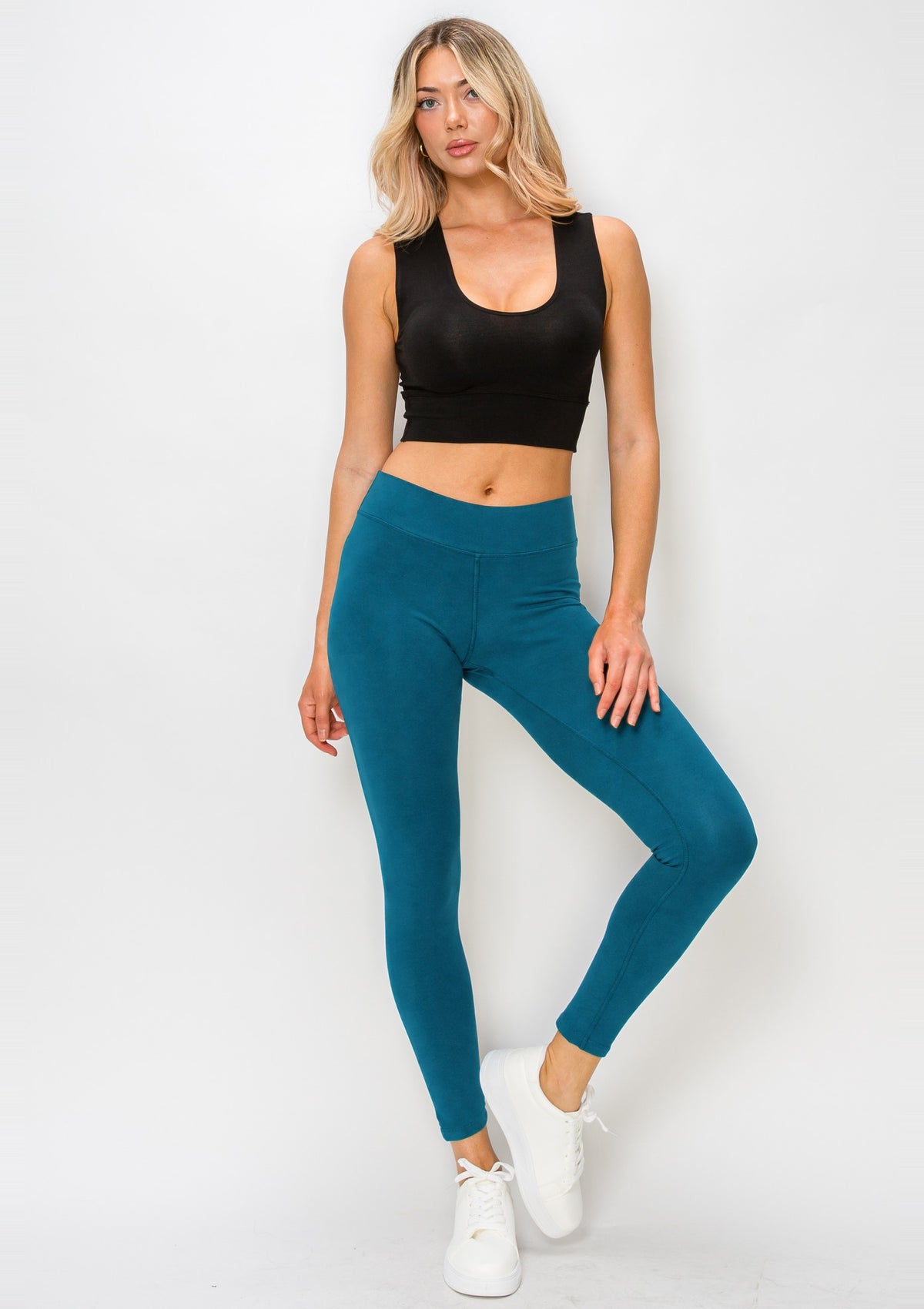 PureFlex Organic Cotton Mid-Rise Leggings in Tidal Teal – full-length front view, one knee bent