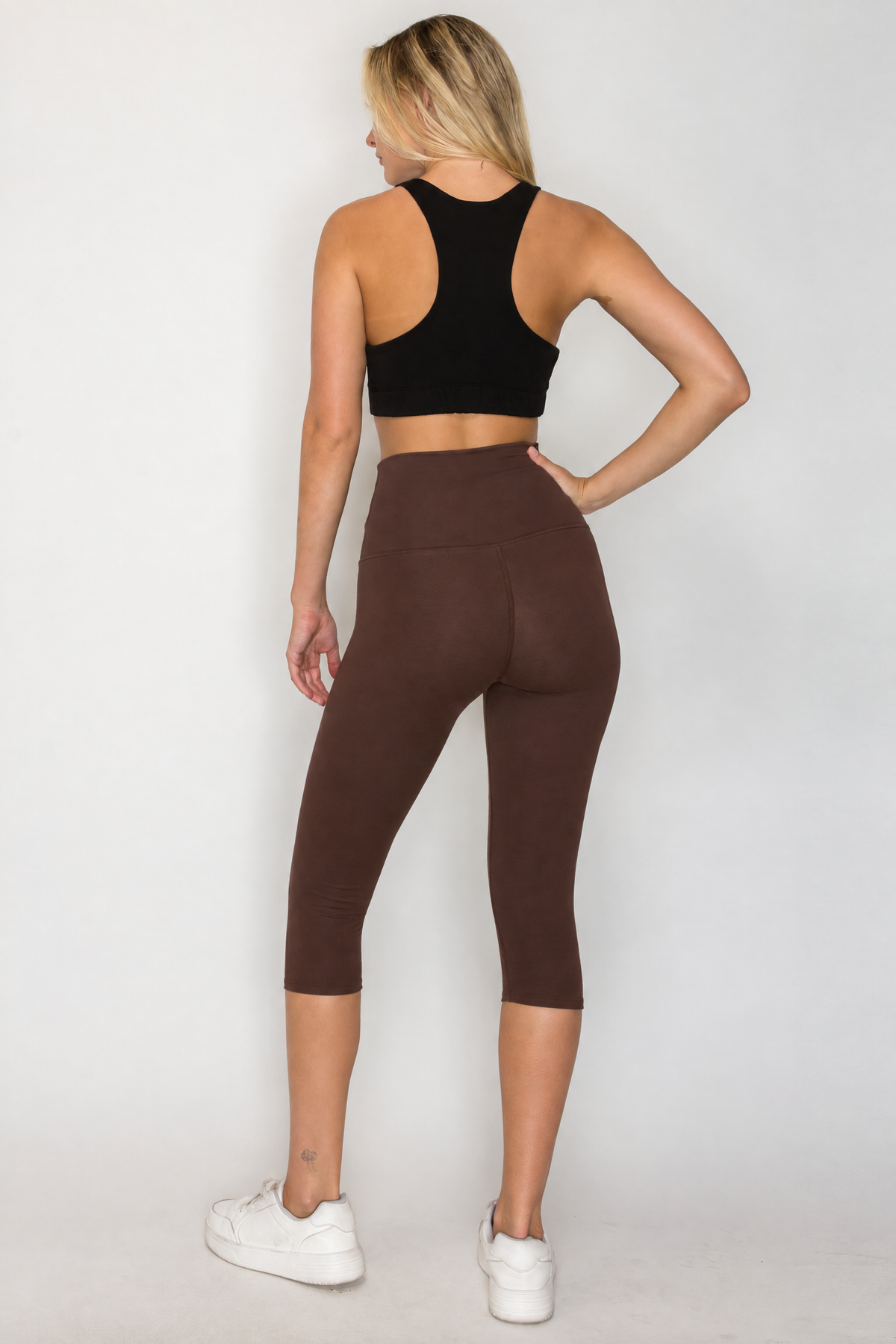 Back view of PuraKai PureFlex Organic Cotton Capri Leggings in Bracken