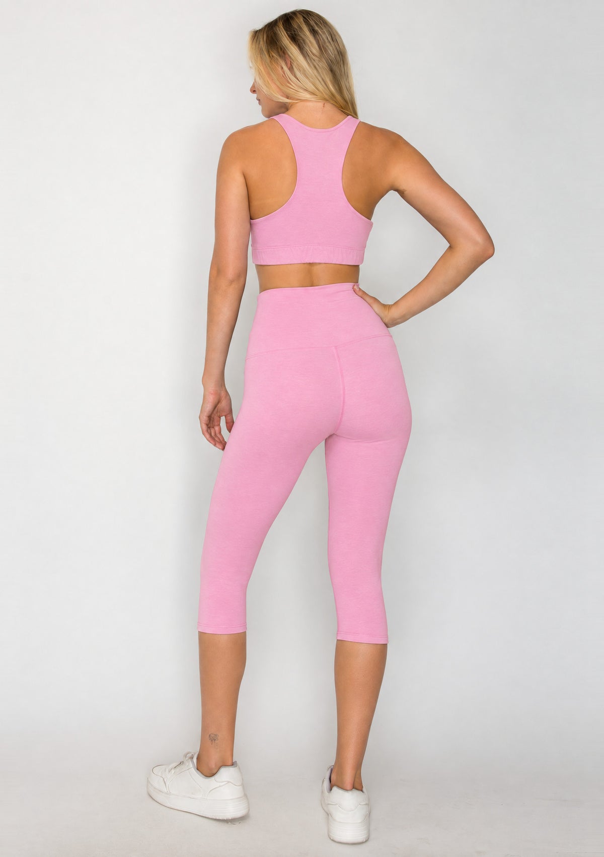 Back view of PureFlex Organic Cotton Capri Leggings in Reef Rose